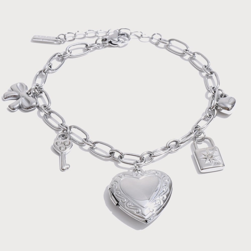 Bracelet à breloques cœur, clé et nœud en acier inoxydable | Bloom × Blaze