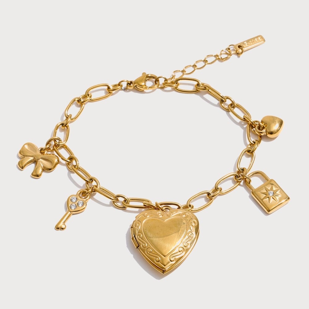 Bracelet à breloques cœur, clé et nœud en acier inoxydable | Bloom × Blaze