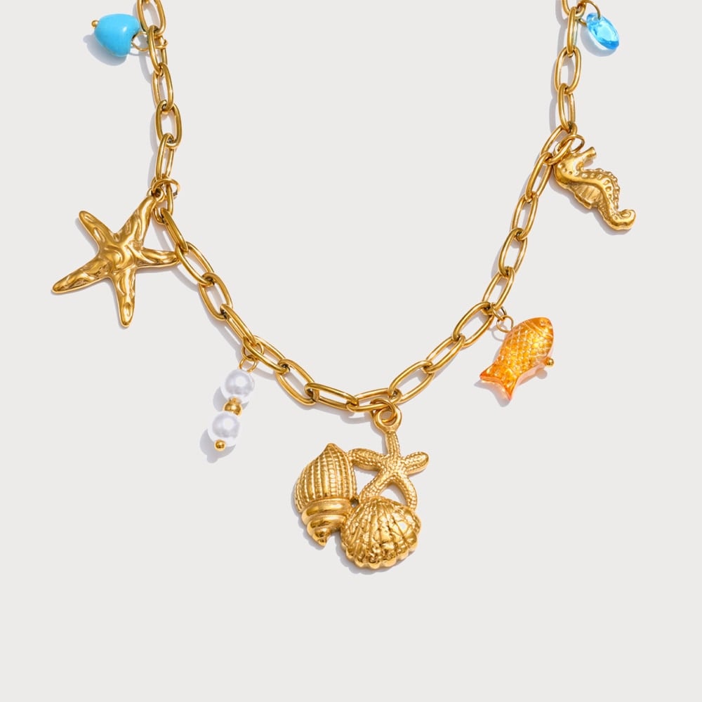 Collier à breloques perles, coquille et cœur en acier inoxydable doré | Bloom × Blaze