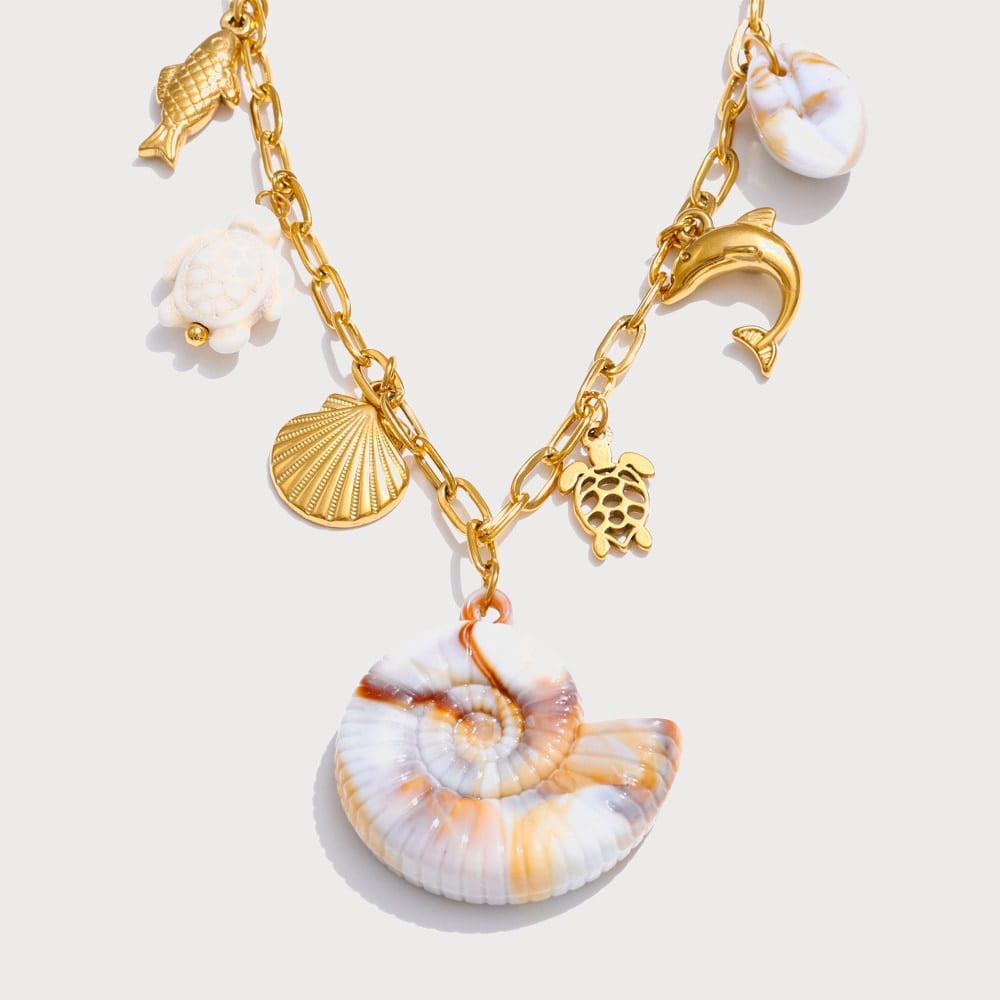Collier multi-breloques dauphin et étoile de mer en acier inoxydable doré | Bloom × Blaze