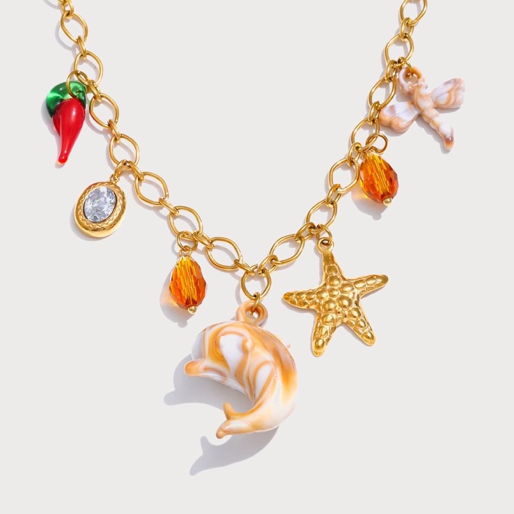 Collier multi-breloques dauphin et étoile de mer en acier inoxydable doré | Bloom × Blaze